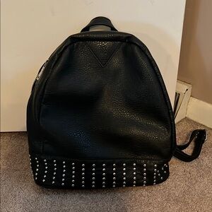 Chic Black Backpack with Silver Accents
